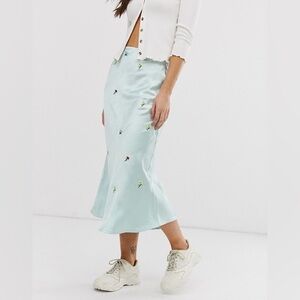 Satin blue midi skirt with floral embroidery